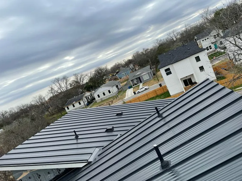 Standing seam metal roof panels with vents for Skylight Repair in McKees Rocks